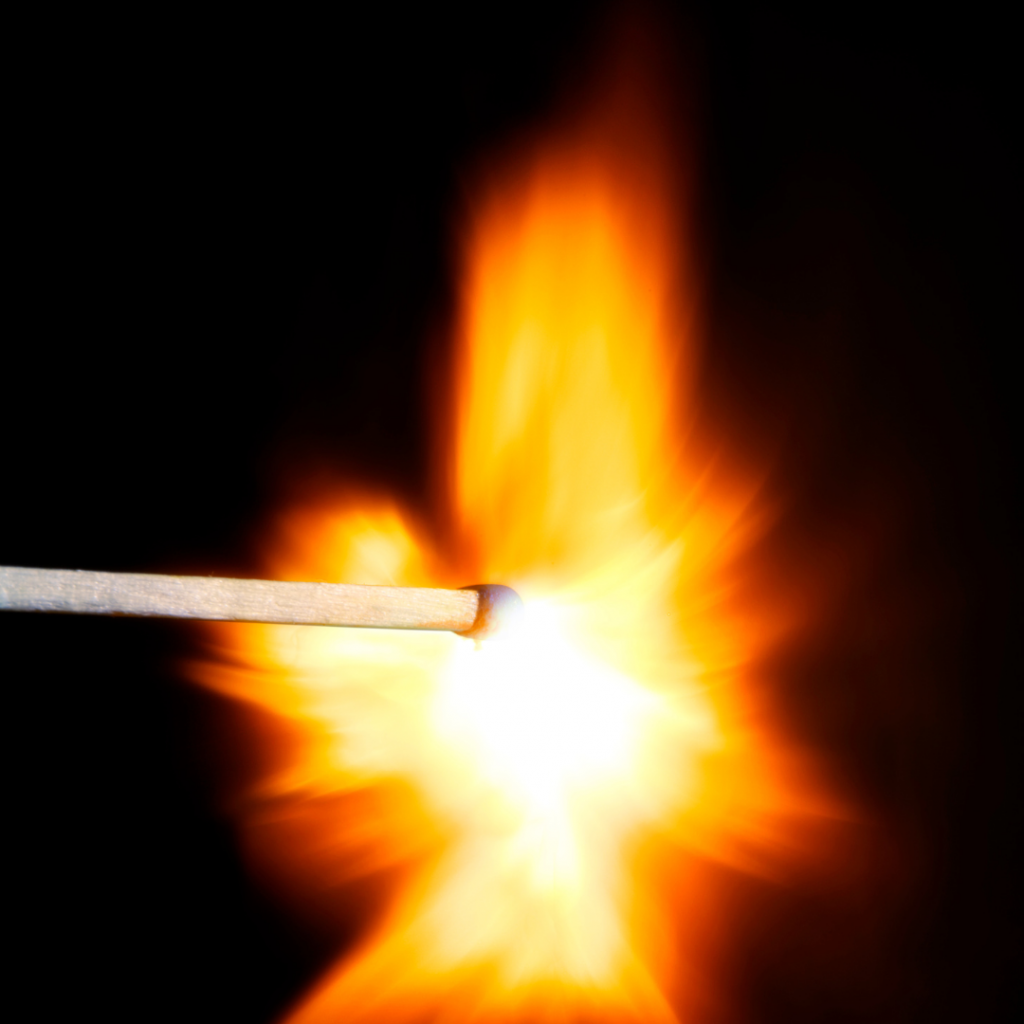 Digital Marketing metaphor image of striking a match to build a fire